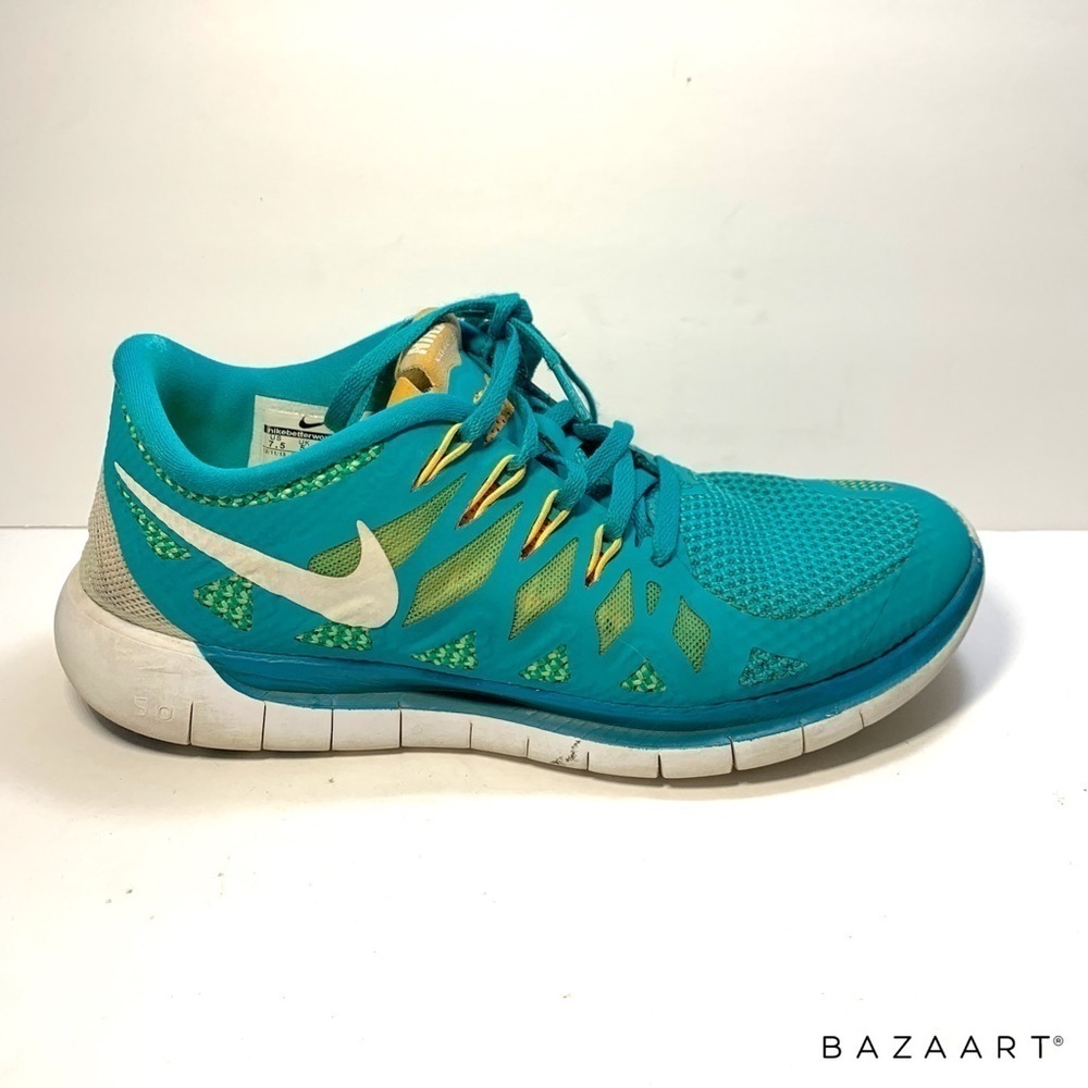 Nike Free run 5.0 teal Women’s running shoes Teal and Yellow Size: 7.5